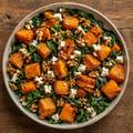 Roasted pumpkin, spinach and feta salad with maple balsamic dressing.