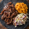 BBQ pulled beef with classic coleslaw and kumara mash.