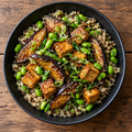 Miso-glazed eggplant & crispy tofu with sesame quinoa & edamame.