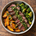 Chimichurri beef with roasted kūmara and charred broccoli.