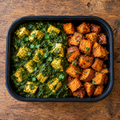 Palak tofu with cumin-roasted sweet potato.