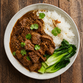 Beef Rendang with steamed jasmine rice & wilted bok choy.