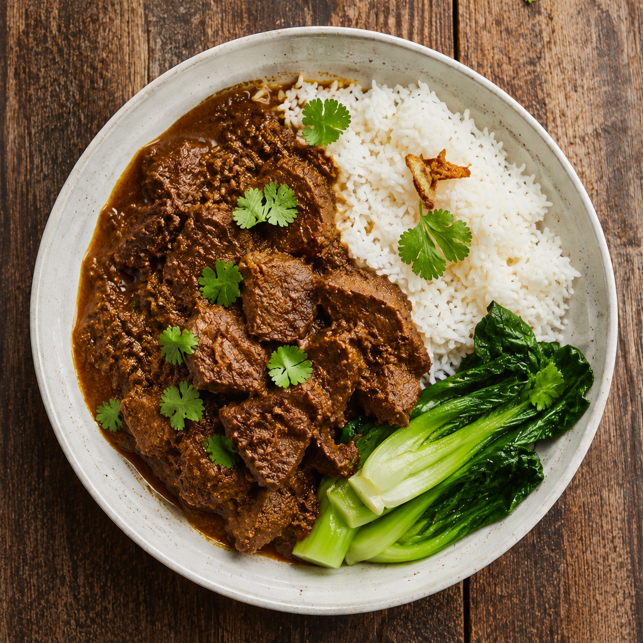 Beef Rendang with steamed jasmine rice & wilted bok choy.